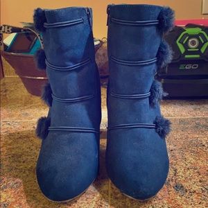 Beautiful pair of heeled navy boots.